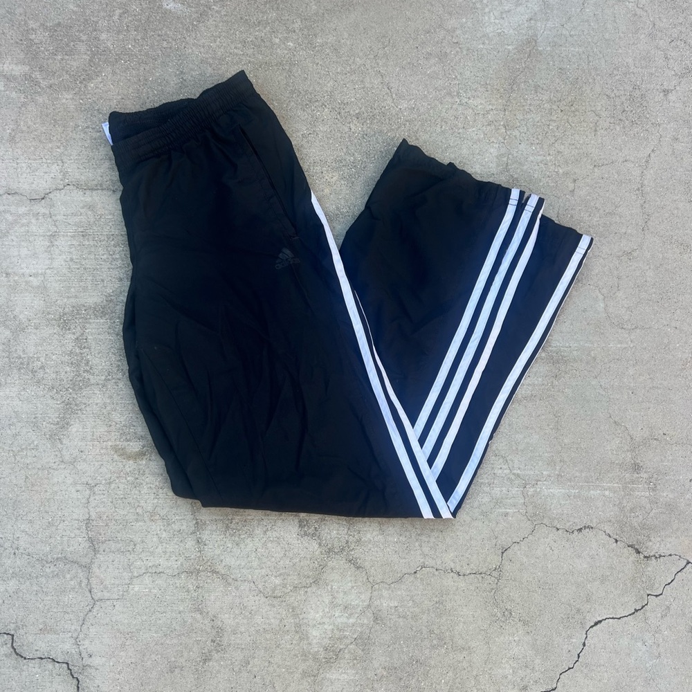 Black and white Adidas track pants